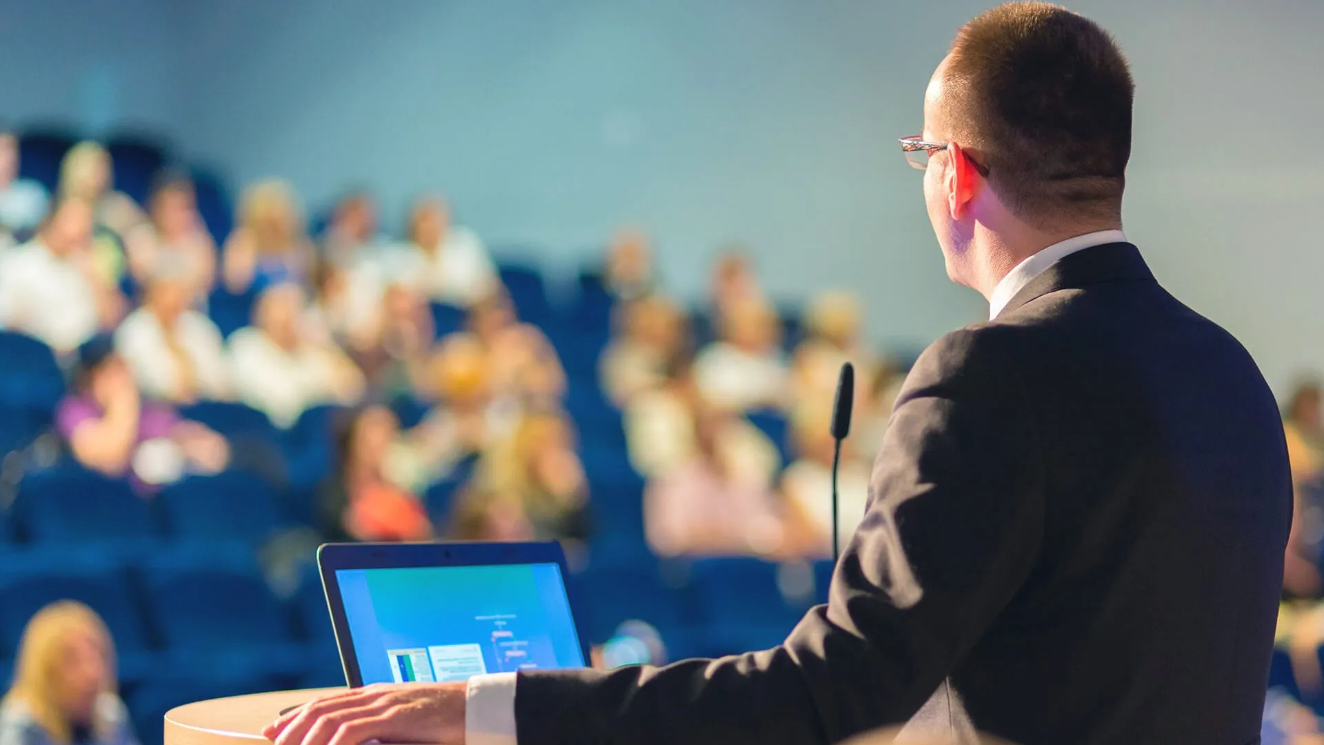 Picture of CEO in a Conference Hall